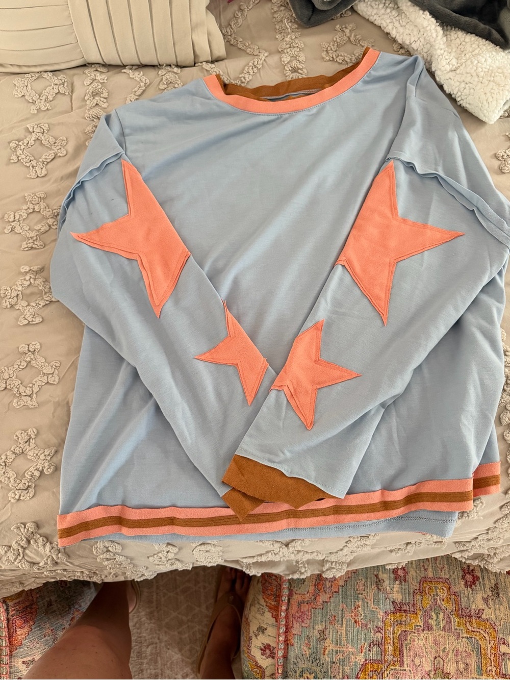 Light Blue Long Sleeve Top with Pink Star Accents